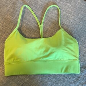 Lululemon green sports bra with racer back. Size 10.  Never worn.